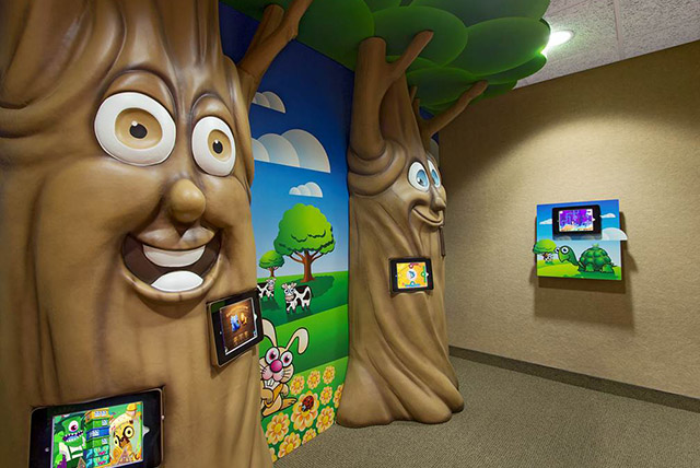 Game wall for pediatric dentist Dr. Kelli Ettelbrick in Flower Mound, TX